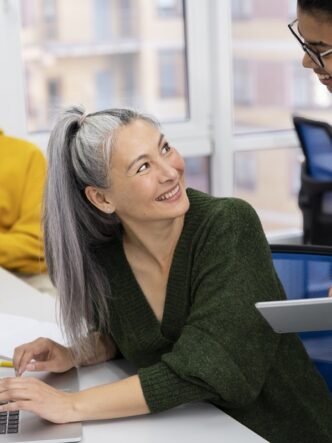 Educator reviewing quiz results to improve course material